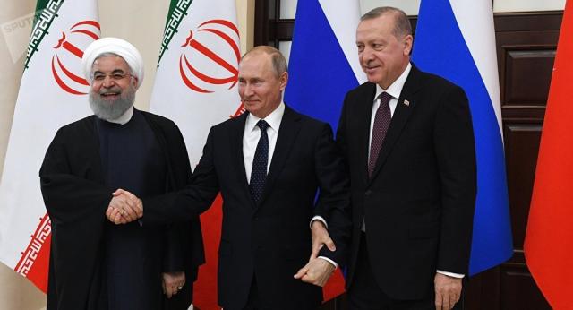 أردوغان وبوتين-وحين روحاني
