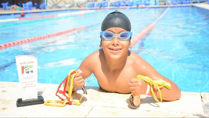 ”الشاذلى” بطل سباحة من ذوى الهمم: نفسي أفرح أهلى وأحقق بطولات أكثر