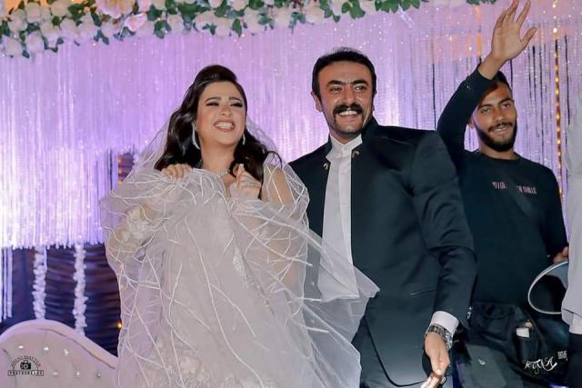 شاهد كواليس حفل زفاف ياسمين عبد العزيز وأحمد العوضي (صور)