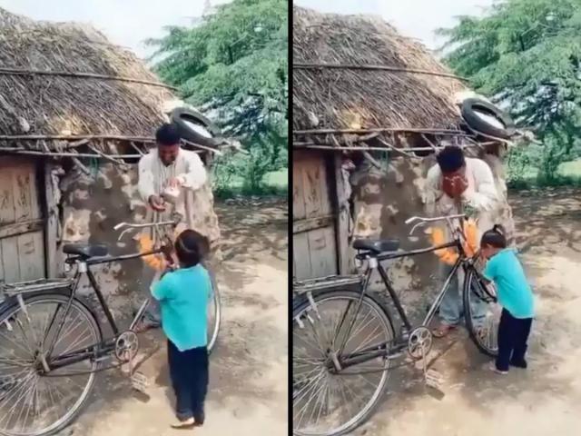 فرحة طفل صغير بعد شراء والده دراجة مستعملة