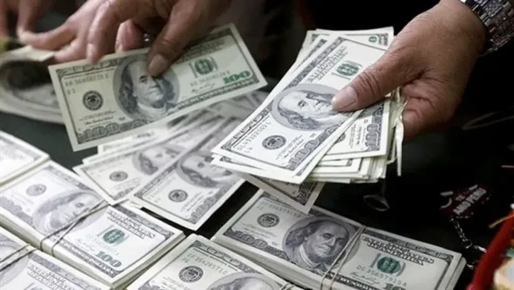 منع تداول عملات أجنبية بالسوق السوداء بحملات للأمن العام