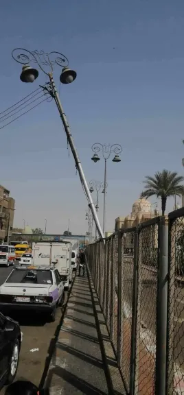 إصلاح عمود إنارة مائلاً بمحيط مسجد سيدي عبدالرحيم القنائي 